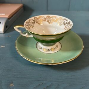 Elegant Green and Gold Teacup and Saucer Set